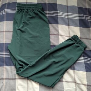 TNA Green Track Pants with Elastic Waistband and Tapered Ankles